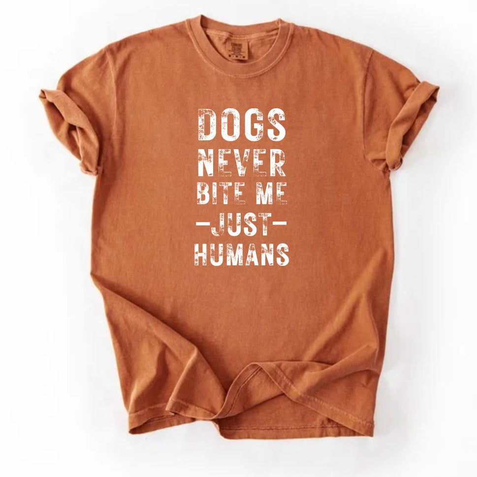 Dogs never bite me T-shirt