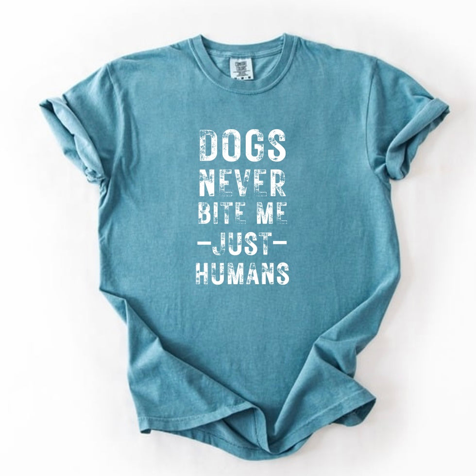 Dogs never bite me T-shirt